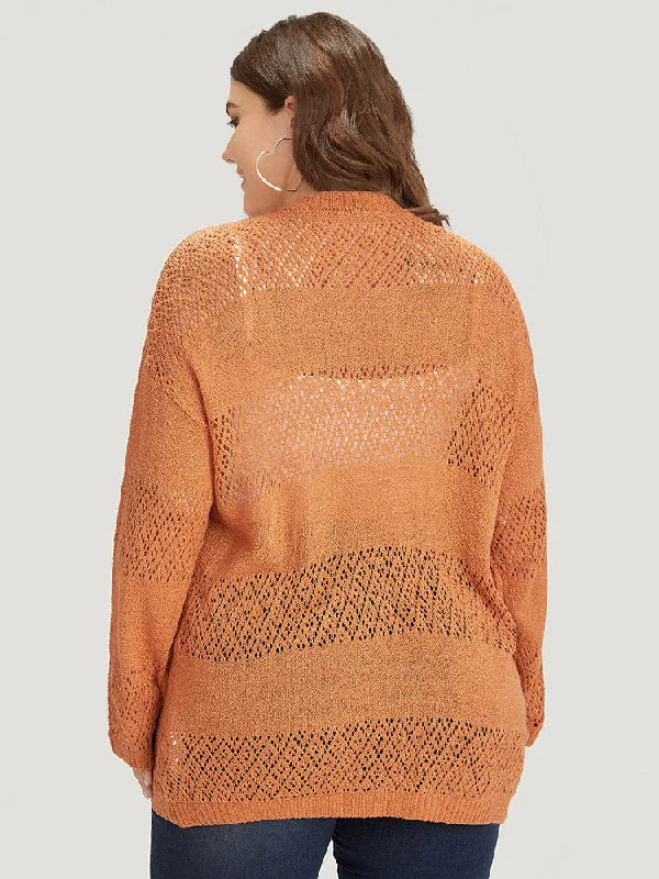 plain-geometric-eyelet-button-through-loose-cardigan